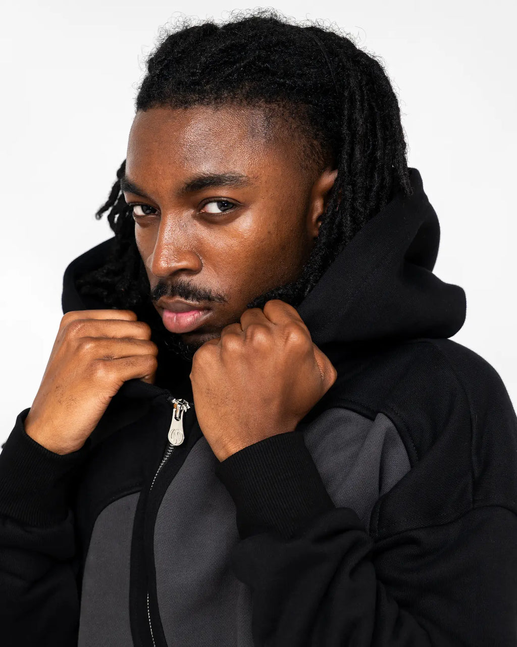 Black Curved Zipper Hoodie Model Small Closeup