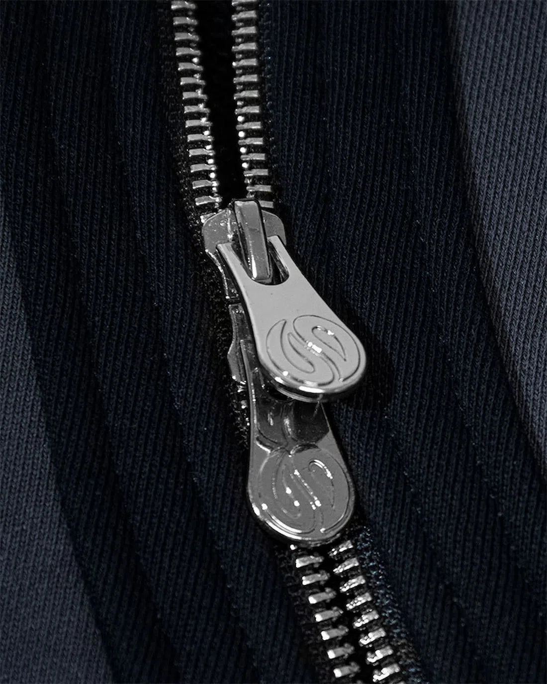 Black Curved Zipper Hoodie custom YKK two-way zipper detail